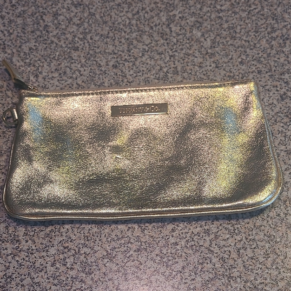 Tiffany & Co  logo plaque gold leather clutch